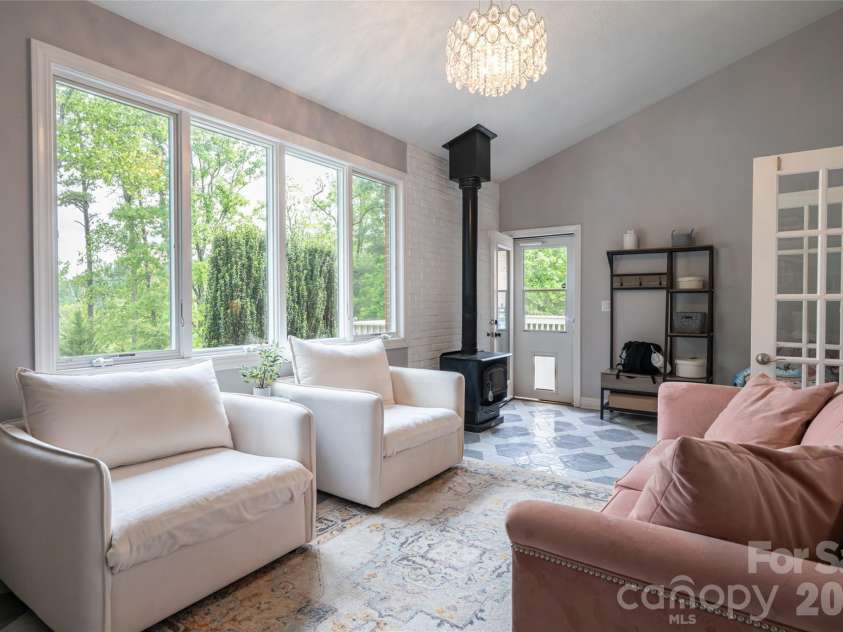 153 Mills Place, Asheville, NC 28804.  MLS# CAR4378268, YatesRealty ID 45336. Sunroom
