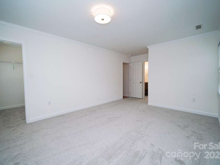5925 Carmel Station Avenue, Charlotte, NC 28226.  MLS# CAR4227662, YatesRealty ID 4534. Primary Bedroom