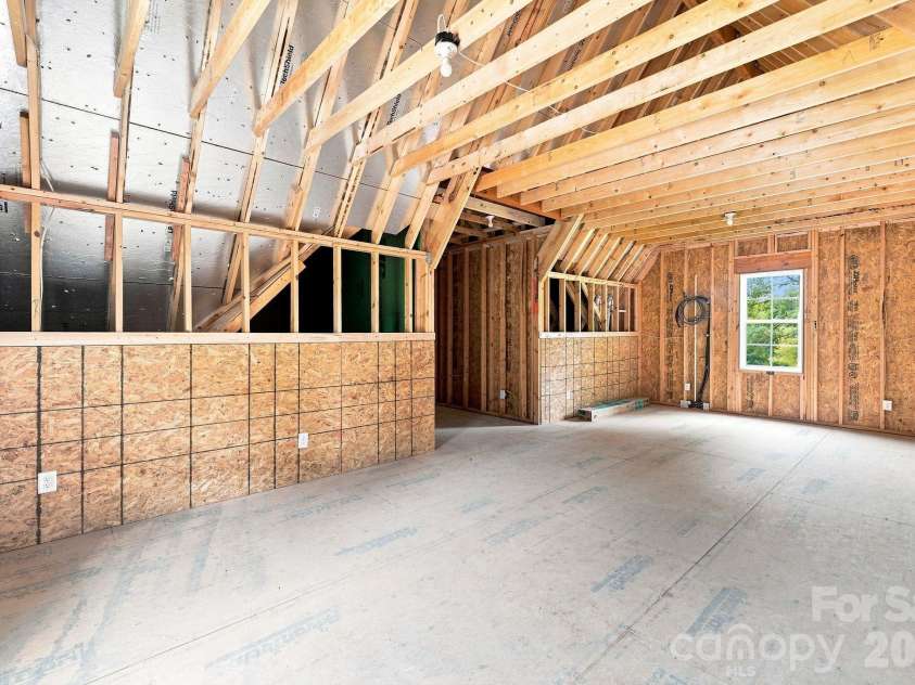125 Randstone Court, Charlotte, NC 28211.  MLS# CAR4386565, YatesRealty ID 45343. Additional unheated upstairs space ready for future customization or exceptional storage