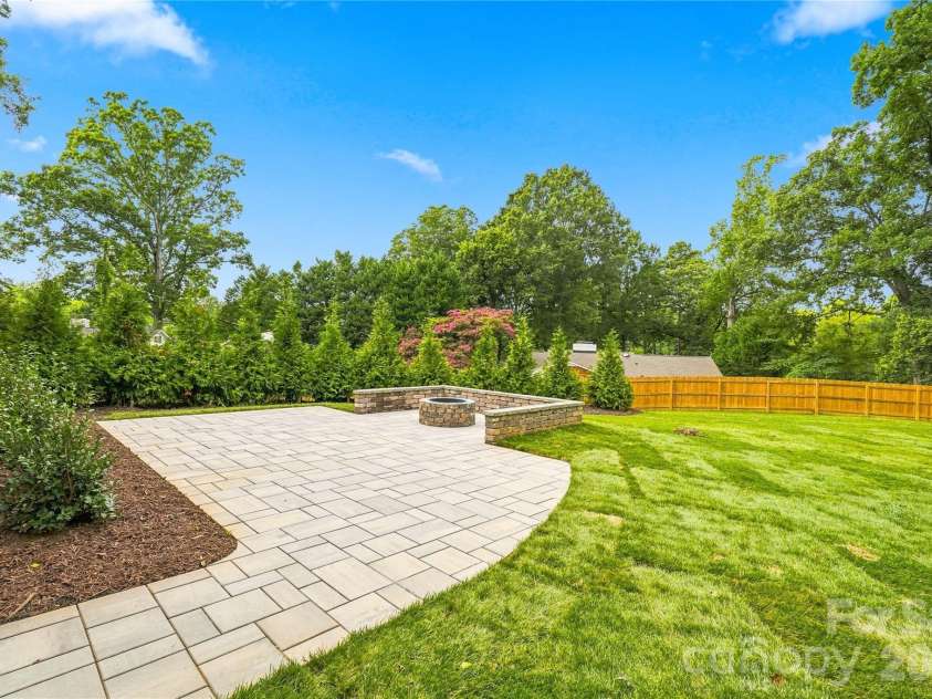 125 Randstone Court, Charlotte, NC 28211.  MLS# CAR4386565, YatesRealty ID 45343. Established firepit and hardscape create an additional outdoor gathering space