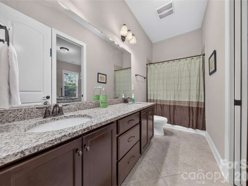4028 Deer Track Court, Mint Hill, NC 28227.  MLS# CAR4397443, YatesRealty ID 45346. Main Floor Full Bath
