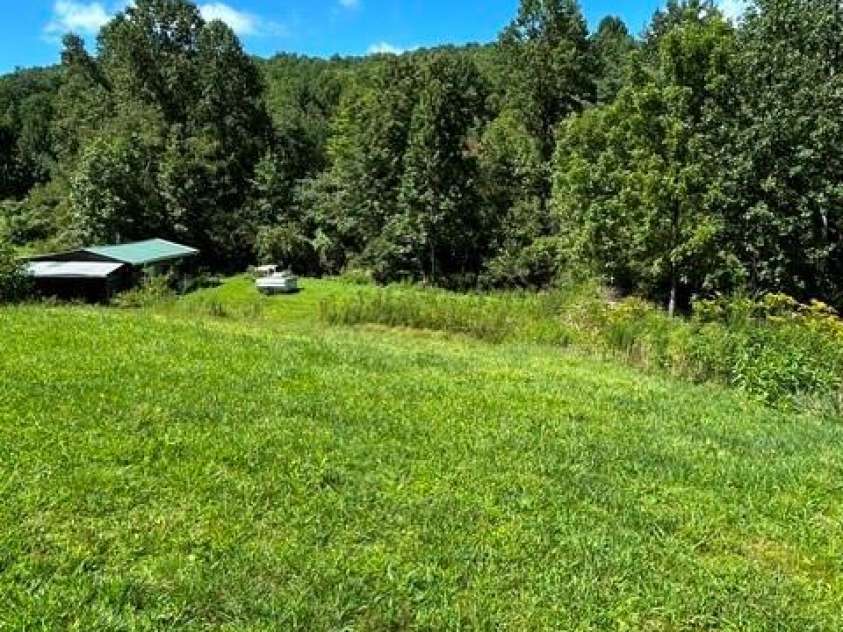 107 Flat Creek Drive, Lake Toxaway, NC 28747.  MLS# CAR4412174, YatesRealty ID 45349. Backyard