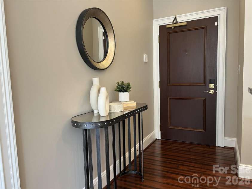 400 Church Street, Charlotte, NC 28202.  MLS# CAR4325886, YatesRealty ID 4535. Entry staged
