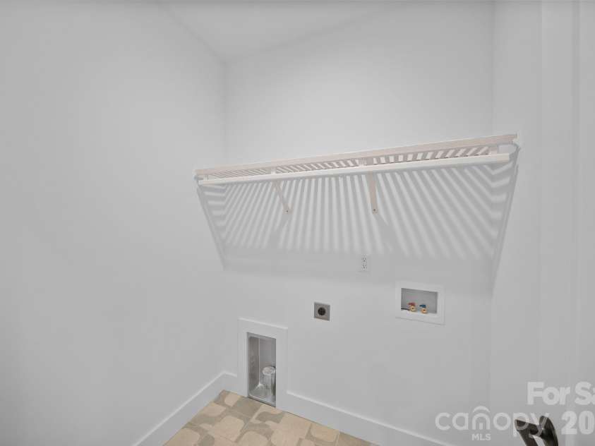 49 Johnson Drive, Asheville, NC 28804.  MLS# CAR4340354, YatesRealty ID 4535. Laundry Room