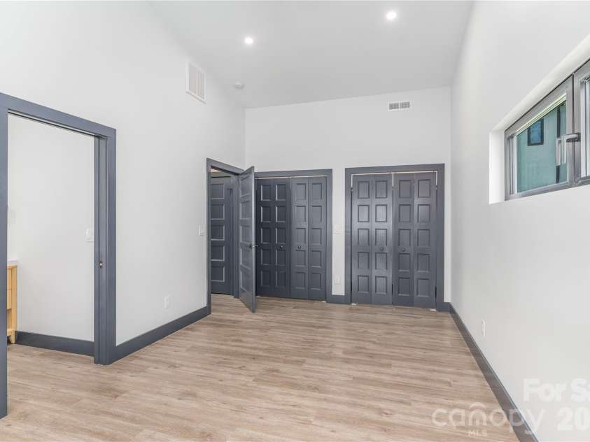 19 Woodbine Road, Asheville, NC 28804.  MLS# CAR4415169, YatesRealty ID 45358. Bedroom two on upper level