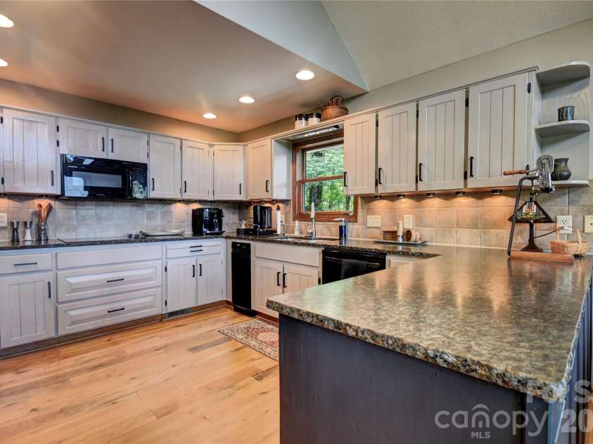 509 Deer Creek Trail, Maggie Valley, NC 28751.  MLS# CAR4408706, YatesRealty ID 45359. Kitchen with loads of cabinet space