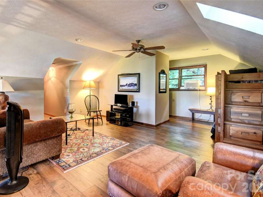 509 Deer Creek Trail, Maggie Valley, NC 28751.  MLS# CAR4408706, YatesRealty ID 45359. Large den/loft area