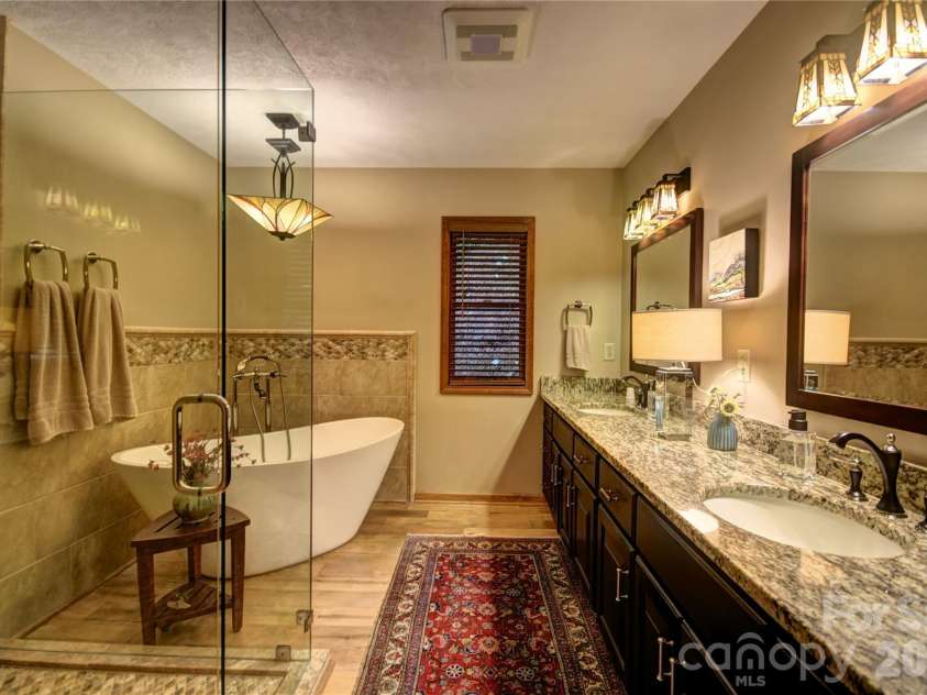 509 Deer Creek Trail, Maggie Valley, NC 28751.  MLS# CAR4408706, YatesRealty ID 45359. Luxurious primary en suite bath