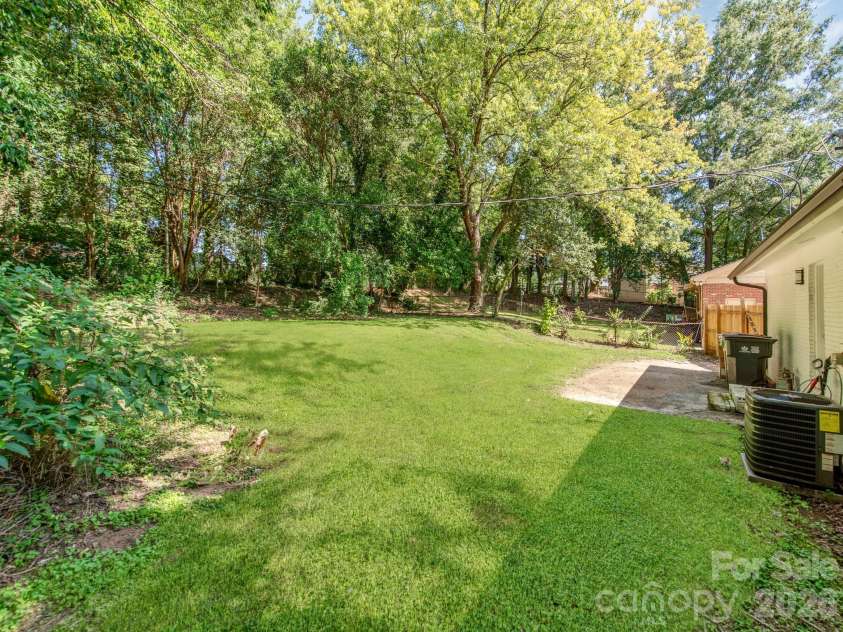 4925 Springview Road, Charlotte, NC 28213.  MLS# CAR4411619, YatesRealty ID 45366. Large Private Fenced in Backyard!