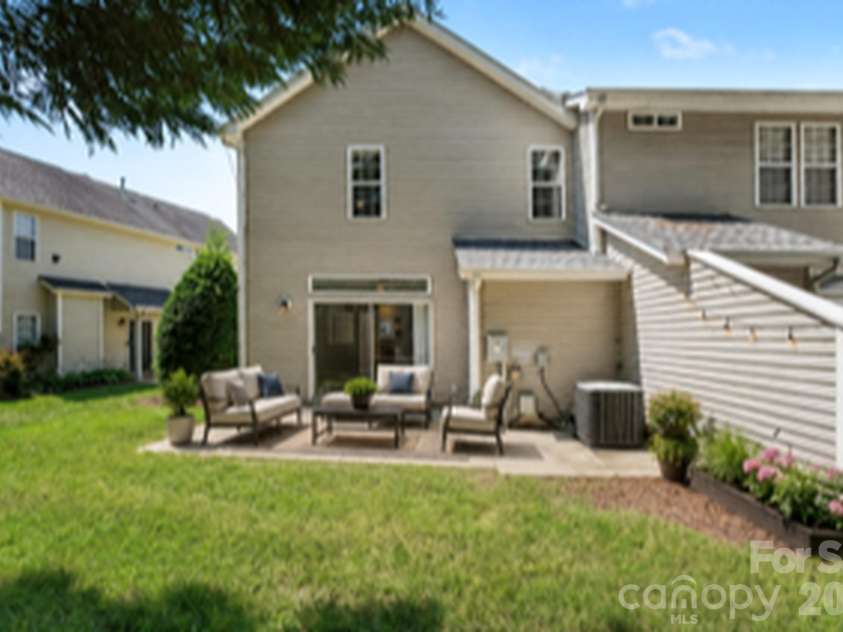 9327 Kimmel Lane, Charlotte, NC 28216.  MLS# CAR4414213, YatesRealty ID 45369. Virtually Staged Backyard