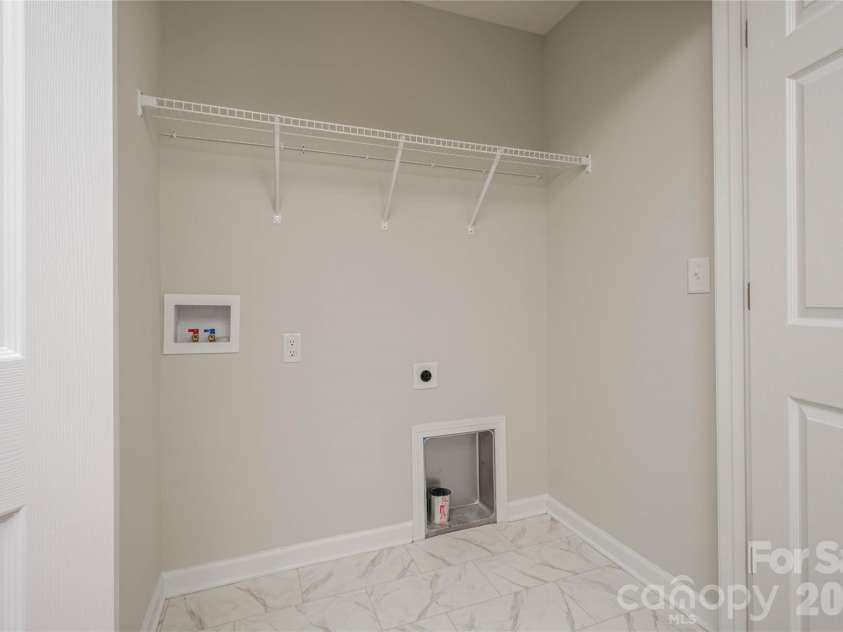 35 Greenly Lane, Fletcher, NC 28732.  MLS# CAR4333662, YatesRealty ID 4538. Laundry Closet Upper Level