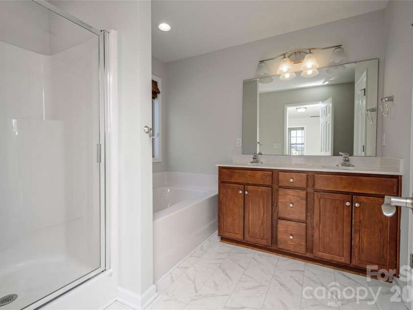 35 Greenly Lane, Fletcher, NC 28732.  MLS# CAR4333662, YatesRealty ID 4538. Primary Bath