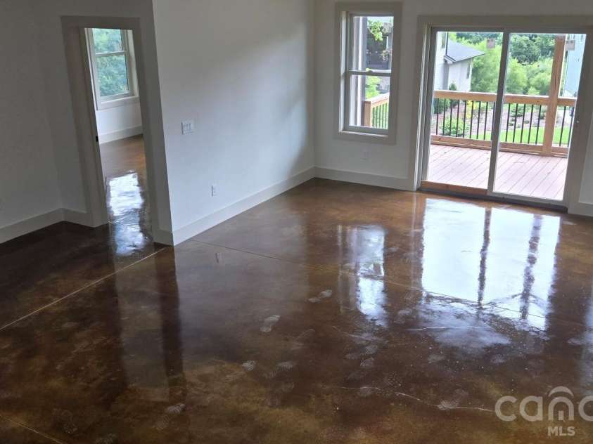 309 Iron Ridge Loop, Asheville, NC 28806.  MLS# CAR4416387, YatesRealty ID 45385. Lower level polished concrete floors