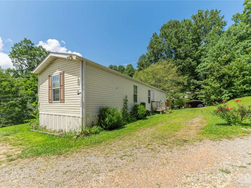 124 Sayles Town Place, Fairview, NC 28730.  MLS# CAR4415601, YatesRealty ID 45387. Level yard