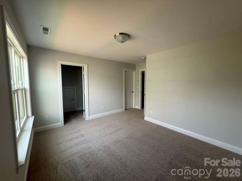4463 Blue Mound Court, Stanley, NC 28164.  MLS# CAR4414818, YatesRealty ID 45388. Upper level bedroom