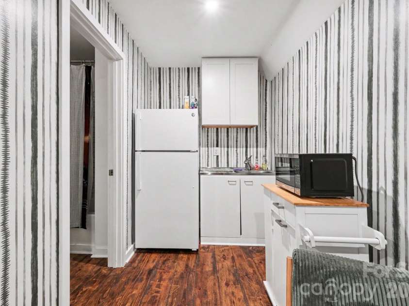 3401 Sherman Drive, Lancaster, SC 29720.  MLS# CAR4386510, YatesRealty ID 4539. Additional living space is set up as two level efficiency apartment with full bathroom - perfect for guests, home office, au pair, teen or grandparents