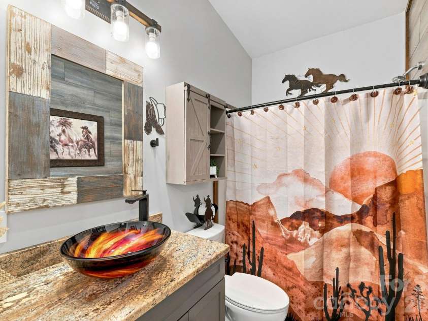 4 Sunset Farms Road, Whittier, NC 28789.  MLS# CAR4416408, YatesRealty ID 45394. Main Hall Bathroom