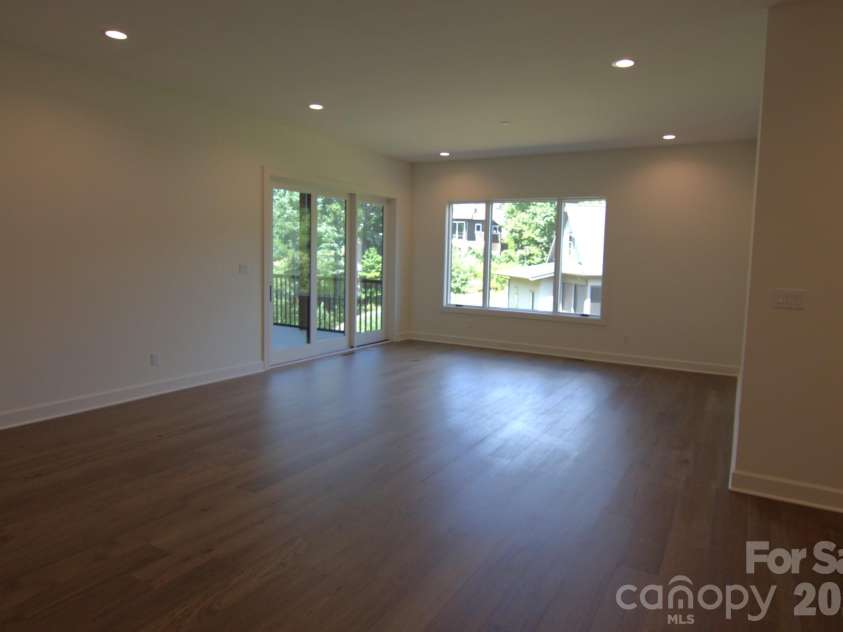 47 Versailles Lane, Asheville, NC 28804.  MLS# CAR4415232, YatesRealty ID 45396. Lower Level Rec Room