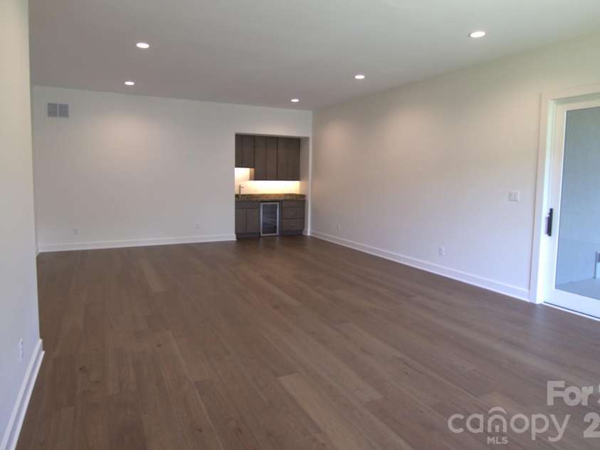 47 Versailles Lane, Asheville, NC 28804.  MLS# CAR4415232, YatesRealty ID 45396. Lower Level Rec Room