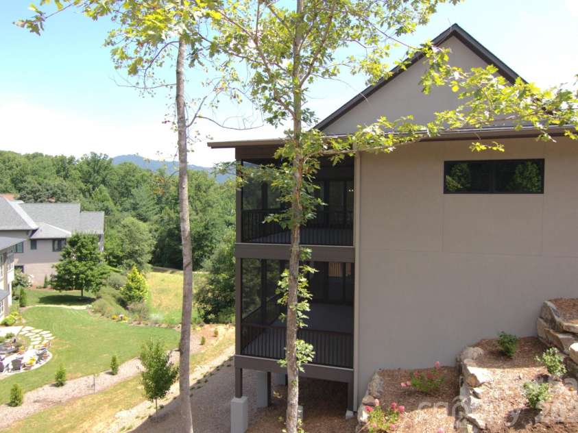 47 Versailles Lane, Asheville, NC 28804.  MLS# CAR4415232, YatesRealty ID 45396. View / Side Elevation
