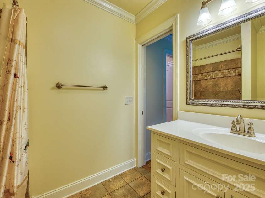 20A Lila Lane, Clyde, NC 28721.  MLS# CAR4258069, YatesRealty ID 454. Basement level bathroom