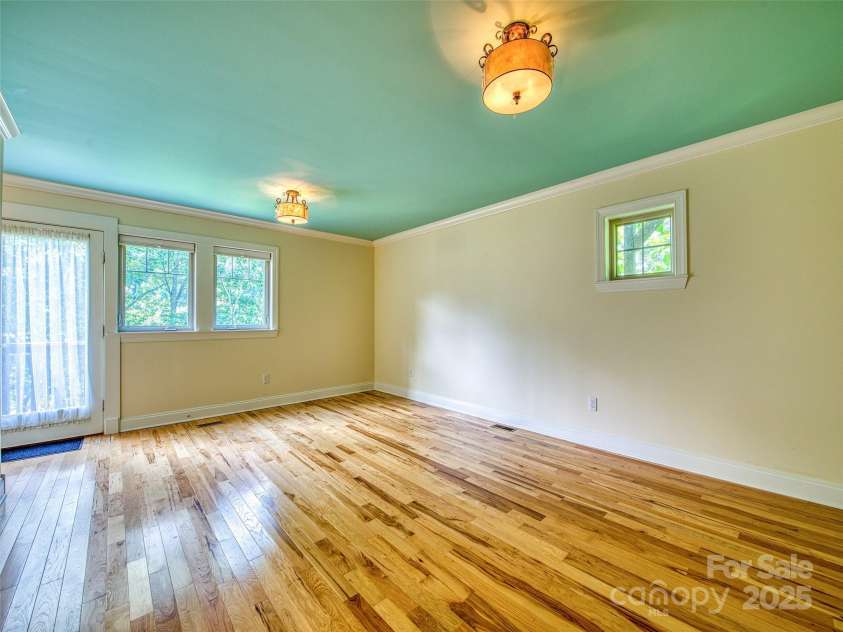 20A Lila Lane, Clyde, NC 28721.  MLS# CAR4258069, YatesRealty ID 454. Basement level bedroom