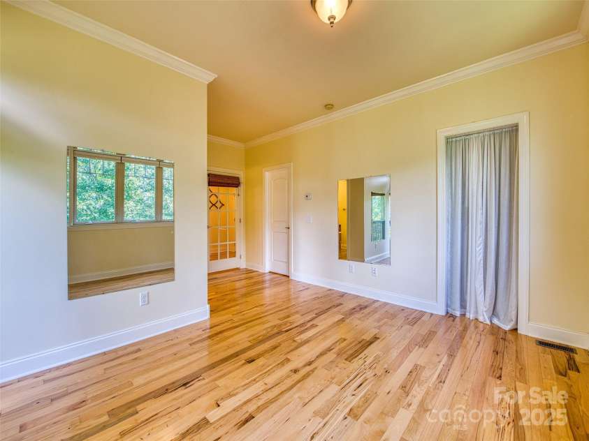20A Lila Lane, Clyde, NC 28721.  MLS# CAR4258069, YatesRealty ID 454. Main level bedroom