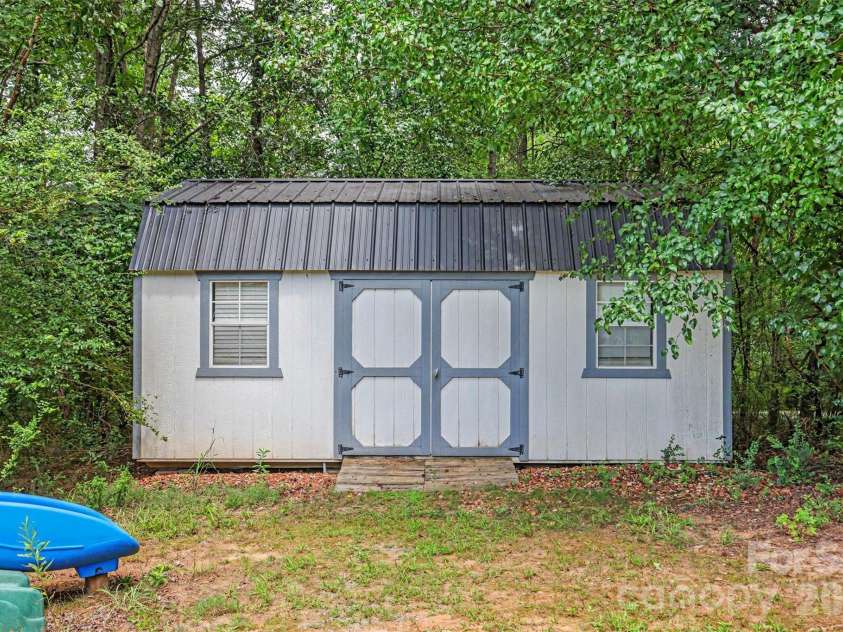 1799 Mill Creek Church Road, Monroe, NC 28110.  MLS# CAR4415878, YatesRealty ID 45403. Workshop/Man-Cave already has a flat screen TV