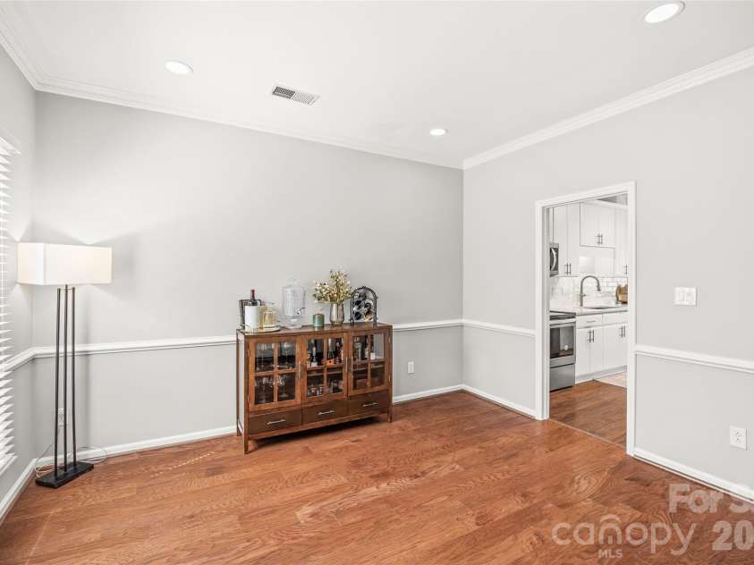 5933 Fitzwilliams Lane, Charlotte, NC 28270.  MLS# CAR4411055, YatesRealty ID 45409. Flexibility here allows for extra living or dining space.