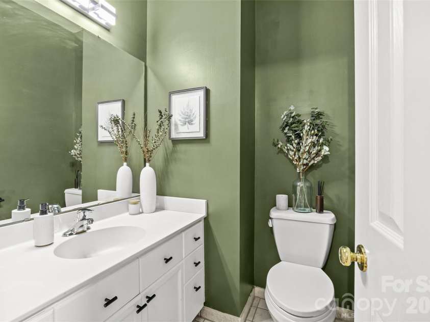 5933 Fitzwilliams Lane, Charlotte, NC 28270.  MLS# CAR4411055, YatesRealty ID 45409. Main level powder room.