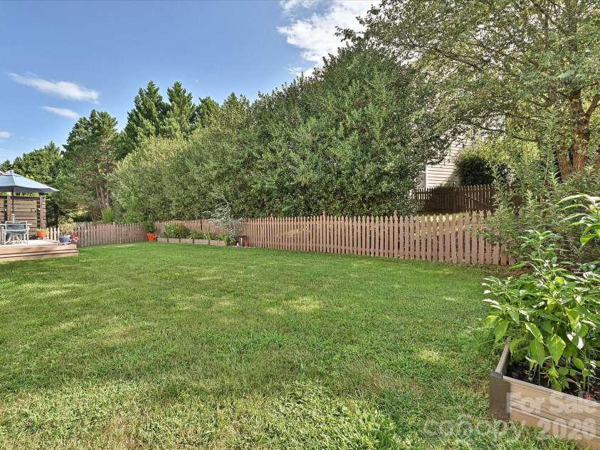 20032 Northport Drive, Cornelius, NC 28031.  MLS# CAR4416087, YatesRealty ID 45414. Back Yard