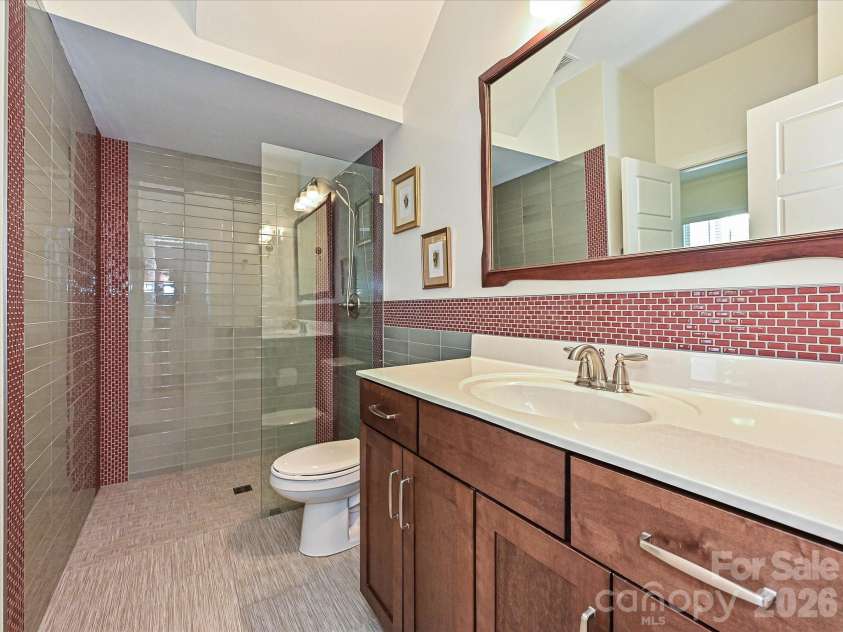 20032 Northport Drive, Cornelius, NC 28031.  MLS# CAR4416087, YatesRealty ID 45414. First Floor Full Bath w/ zero-entry shower