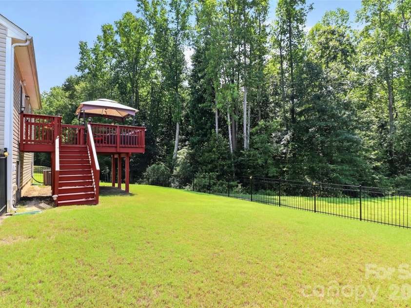 1051 Ava Trail Lane, Clover, SC 29710.  MLS# CAR4415650, YatesRealty ID 45415. Oversized Yard with Fence