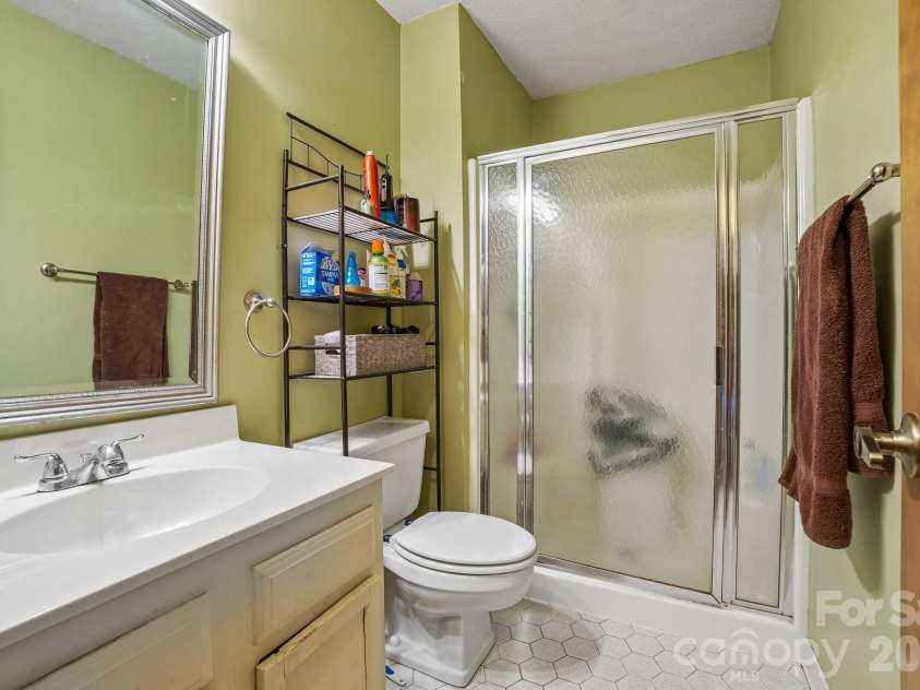 210 Juniper Lane, Hendersonville, NC 28739.  MLS# CAR4413823, YatesRealty ID 45418. 