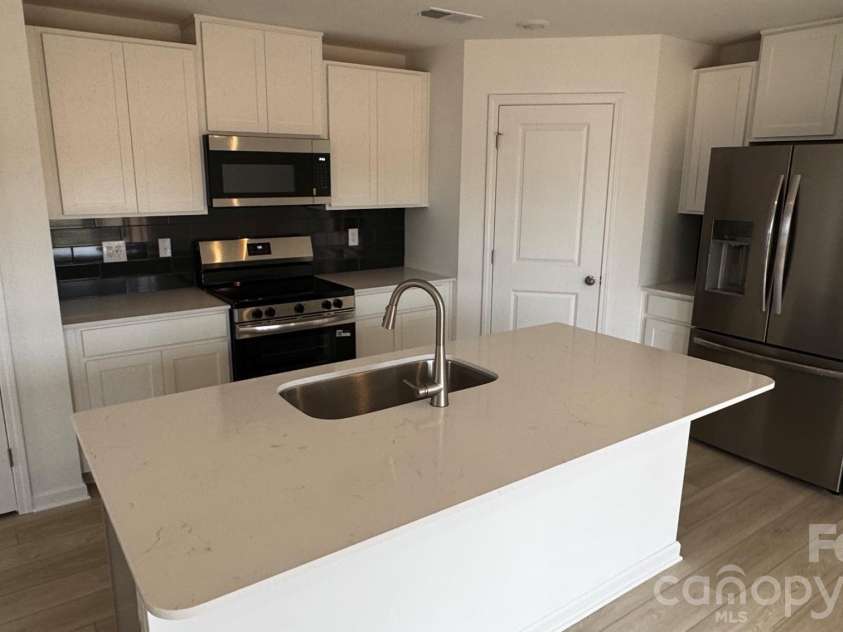 4063 Oxford Glen Drive, Claremont, NC 28610.  MLS# CAR4416448, YatesRealty ID 45421. 