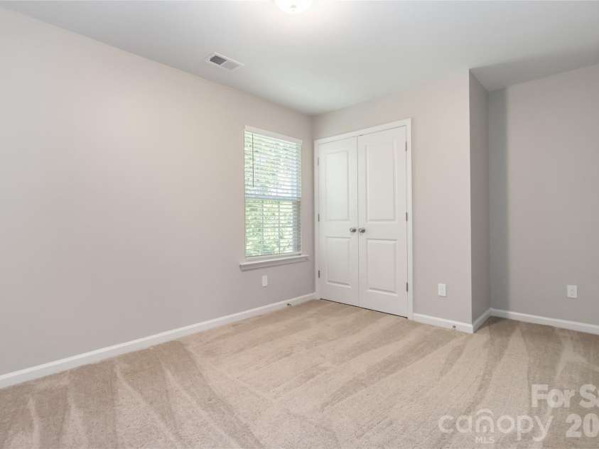 7623 Reames Road, Charlotte, NC 28216.  MLS# CAR4416327, YatesRealty ID 45423. Bedroom Four
