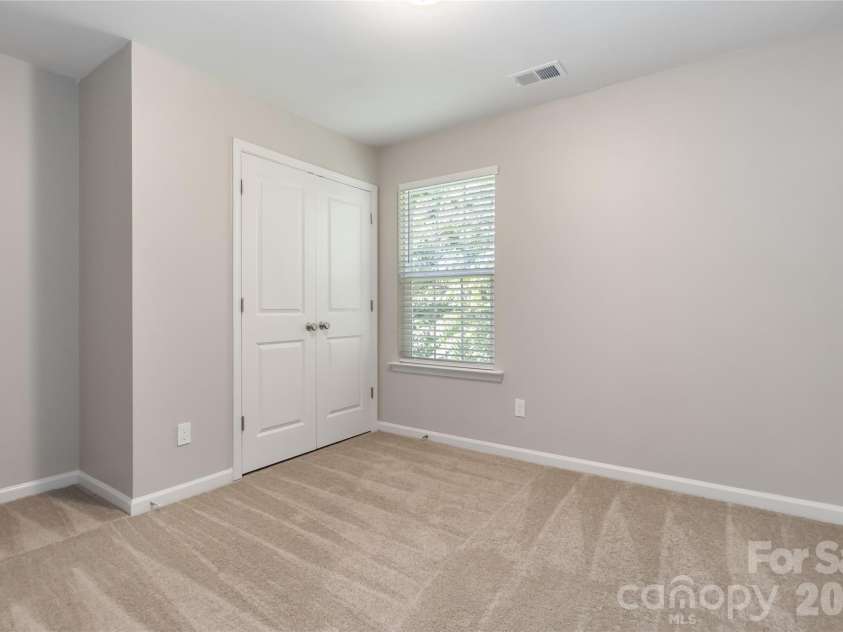 7623 Reames Road, Charlotte, NC 28216.  MLS# CAR4416327, YatesRealty ID 45423. Bedroom Three