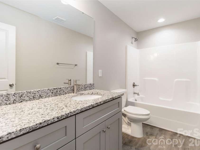 7623 Reames Road, Charlotte, NC 28216.  MLS# CAR4416327, YatesRealty ID 45423. Ensuite with dual sinks