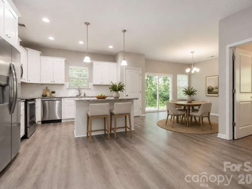 7623 Reames Road, Charlotte, NC 28216.  MLS# CAR4416327, YatesRealty ID 45423. Virtually Staged Kitchen & Dining