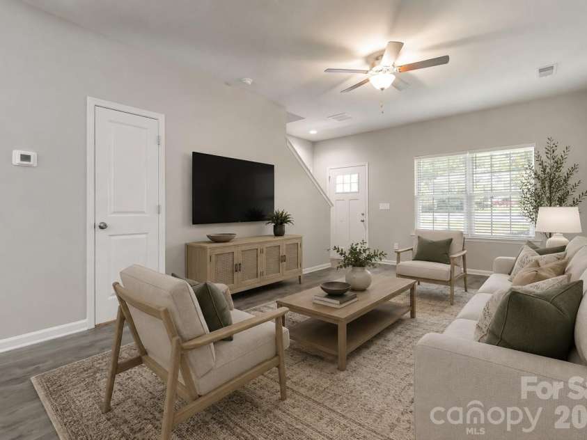 7623 Reames Road, Charlotte, NC 28216.  MLS# CAR4416327, YatesRealty ID 45423. Virtually Staged Living Room