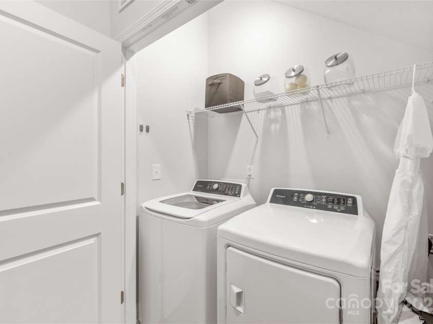 411 Belton Street, Charlotte, NC 28209.  MLS# CAR4321222, YatesRealty ID 4543. Laundry day made easy! Located on the first floor for ultimate convenience.