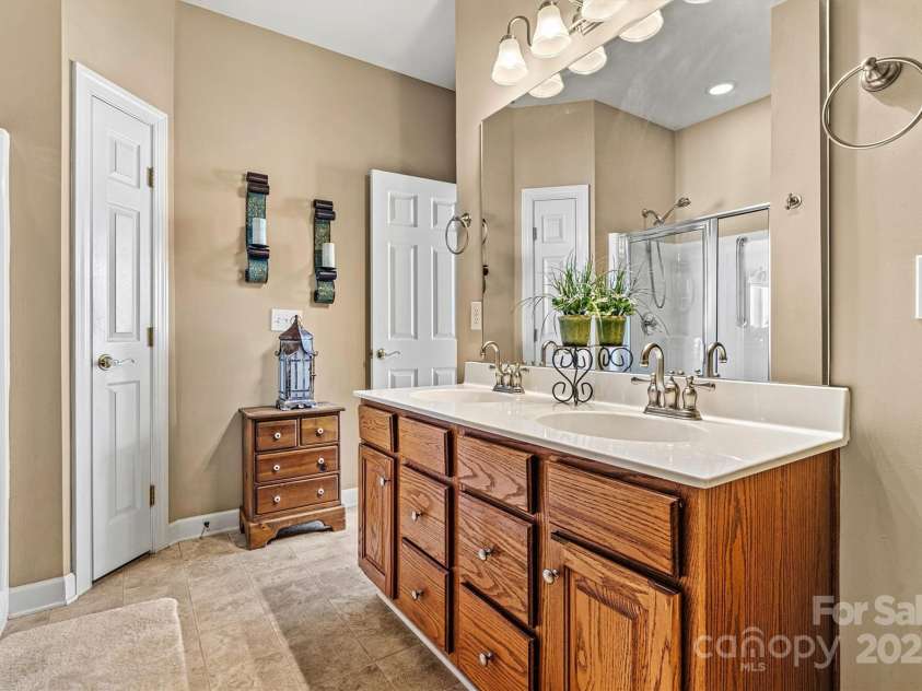 5472 Ives Street, Concord, NC 28027.  MLS# CAR4223676, YatesRealty ID 4543. Jack and jill bathroom connecting 2nd and 3rd bedrooms (upstairs)