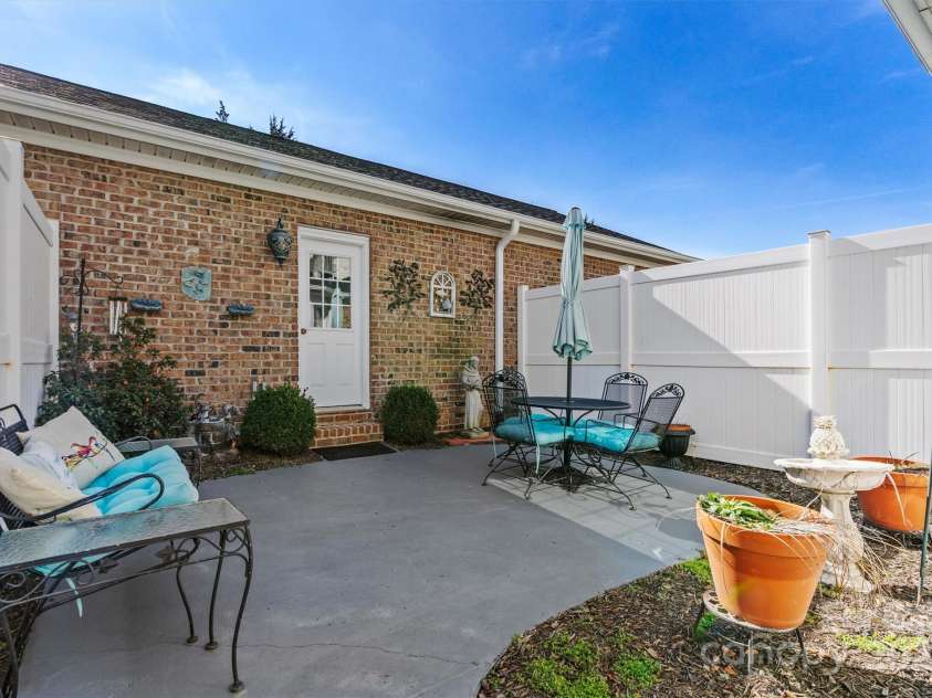 5472 Ives Street, Concord, NC 28027.  MLS# CAR4223676, YatesRealty ID 4543. Private courtyard out back
