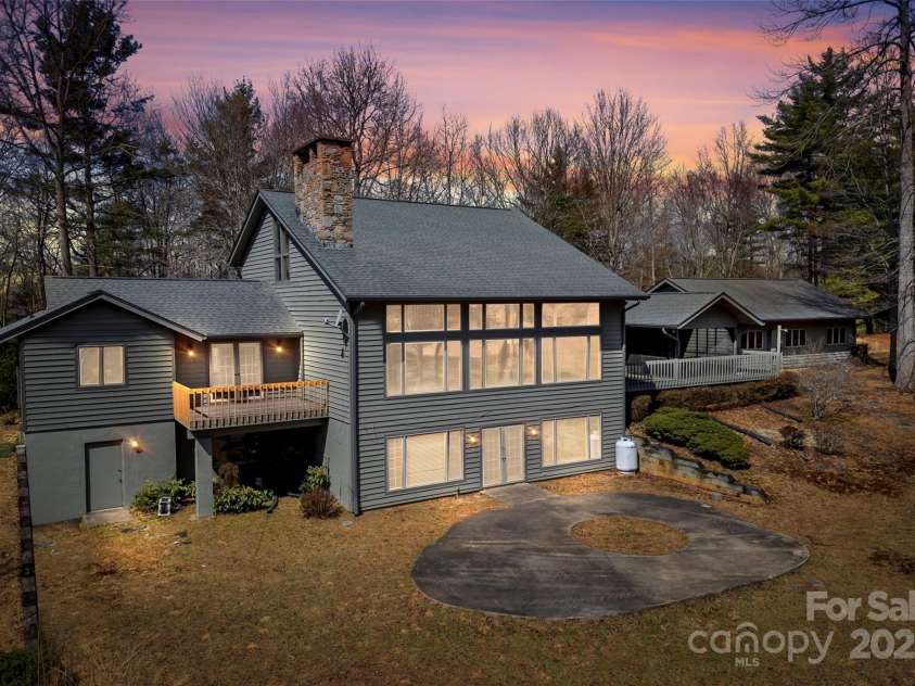 674 Walnut Ridge Road, Brevard, NC 28712.  MLS# CAR4235374, YatesRealty ID 4544. Main House - Back (Twilight Edit)