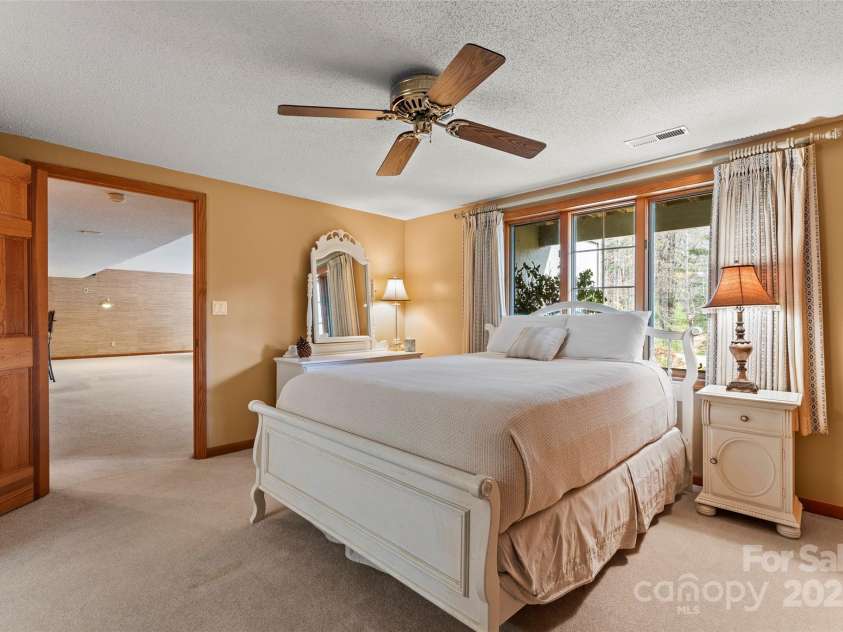 674 Walnut Ridge Road, Brevard, NC 28712.  MLS# CAR4235374, YatesRealty ID 4544. Main House - Basement Level - Bedroom #4