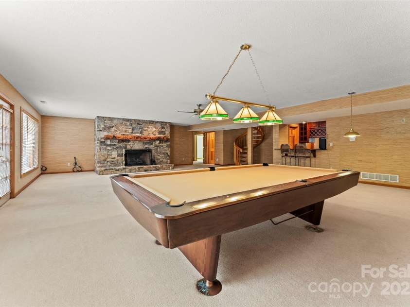 674 Walnut Ridge Road, Brevard, NC 28712.  MLS# CAR4235374, YatesRealty ID 4544. Main House - Basement Level - Family Room