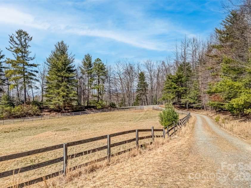 674 Walnut Ridge Road, Brevard, NC 28712.  MLS# CAR4235374, YatesRealty ID 4544. Pasture and Road View From Barn