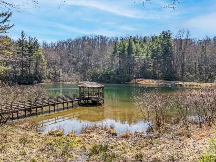 674 Walnut Ridge Road, Brevard, NC 28712.  MLS# CAR4235374, YatesRealty ID 4544. Spring-Fed Lake