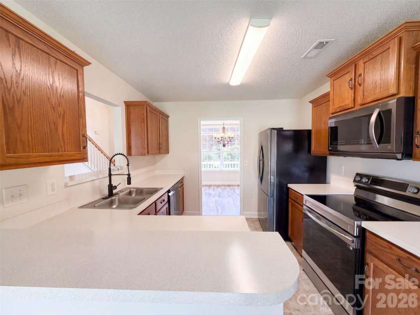9244 Simonton Drive, Charlotte, NC 28269.  MLS# CAR4416486, YatesRealty ID 45443. 