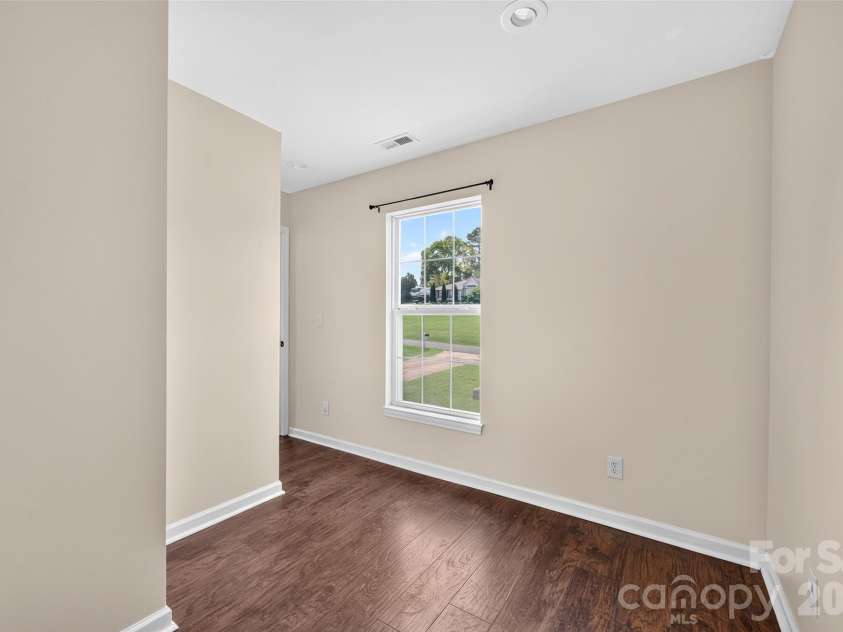 10724 Kingsview Drive, Davidson, NC 28036.  MLS# CAR4409874, YatesRealty ID 45444. Hallway on second level. Room for toys, storage, desk, etc.